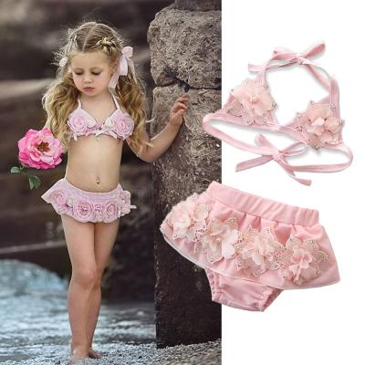 China 2020 breathable European and American summer boutique children's bikini swimwear set new fresh petal neck hanging swimsuit for sale