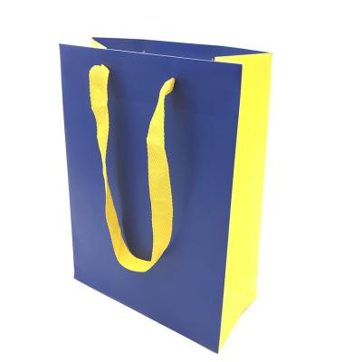 China Outdoor Waterproof Luxury Ribbon Handle Boutique Shopping Packaging Custom Printed Gift Paper Bags With Logo for sale