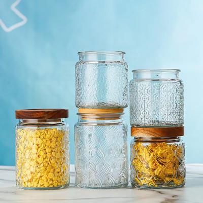 China Wholesale High Borosilicate Airtight Storage Container Glass Jar With Cork Lid Kitchen Dried Fruit Cereal Storage Glass Jars for sale