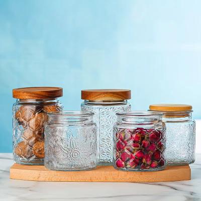 China High Quality Borosilicate Glass Food Storage Container Jar Cylinder Glass Design Storage Preservation Jar With Wooden Cover for sale