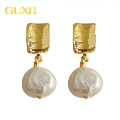 China Other Handmade Baroque Pearl Stud Earrings With Concave And Convex Surface for sale