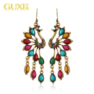 China Other long earrings diamond alloy earrings personality earrings retro peacock creative ethnic style cavity for sale