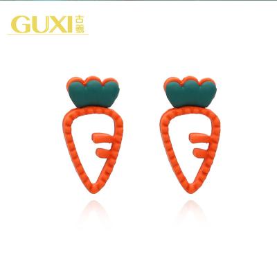 China Other New Creative Simple Radish Vegetable Earrings Shape Cute Style Paint Hollow Earrings Personalized Earrings for sale