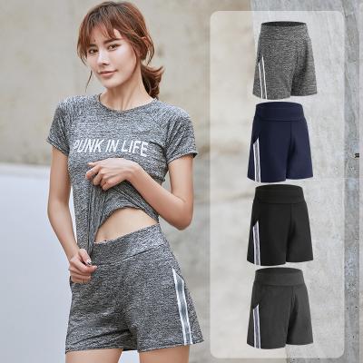 China QUICK DRY High Waisted Pocket Soft Breathable Short Workout Sports Women Running Shorts for sale