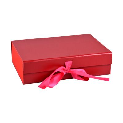 China Handmade Custom Gift Packaging Foldable Magnetic Gift Box With Ribbon Closure for sale