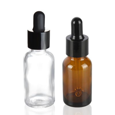 China Fancy Cosmetic Essential OilRound Cosmetic Amber Glass Dropper Packaging Bottles for sale