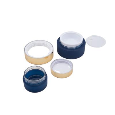 China Bargain Price Cosmetic Navy Blue Round Face Cream PETG Plastic Empty Cosmetic Jar for sale