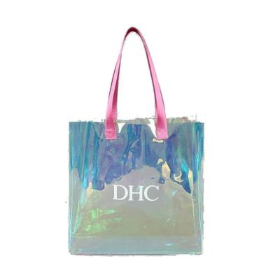 China NATIONAL RAINBOW Wholesale Clear Plastic Hologram PVC Tote Bag Fashion Design Handle Transparent Holographic Beach Shopping Bag for sale