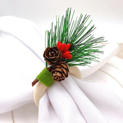 China Hotel tableware christmas decoration napkin ring pinecone napkin loop napkin ring viable mouth for sale