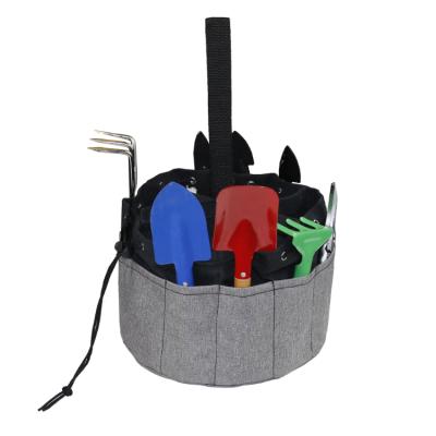 China Large Capacity Multi Pocket Drawstring Bucket Tool Storage Waterproof Round Heavy Duty Bag for sale