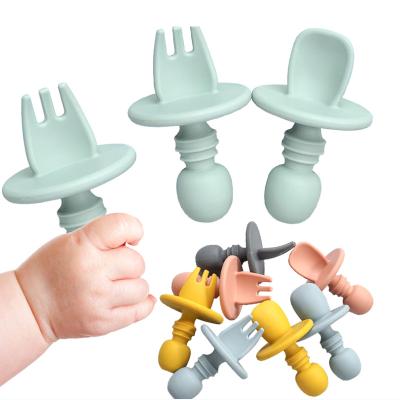 China First Stage Silicone BPA Free Soft Toddler Free Utensils Weaning Chewable Utensils For Baby Self Feeding Spoon And Fork for sale