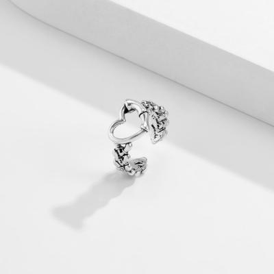 China Adjustable High Quality Jewelry Pave Knuckle Ring Women Hollow Heart Silver Open Ring for sale