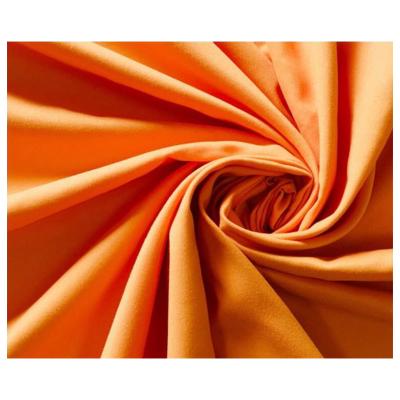 China Waterproof high quality 100% poly satin face microfiber peach skin fabric for beach shorts bags lining or children fabric for sale