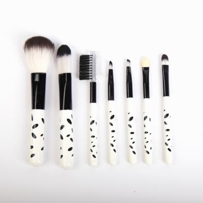 China Angular Blush Professional Cow Pattern Handle Makeup Set Brush Customized Wooden Cosmetics With Barrel for sale