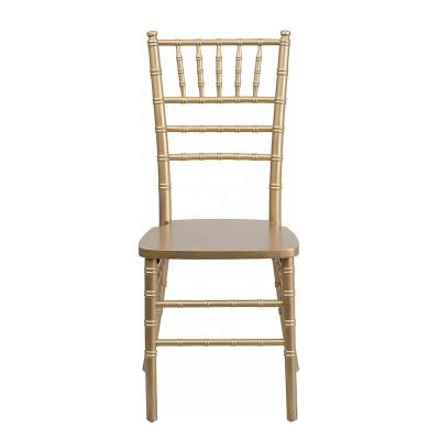 China Modern Luxury Cheap Stacking Gold Color Wedding Chair Tiffany Chair Chiavari Chair Wooden Wooden For Event for sale