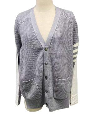 China Casual Anti-wrinkle designer best four-bar contrast color fashion v neck stitching cardigan for sale