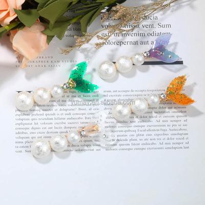 China Plastic Pearl Rhinestone Fish Tail Shape Barrette Clip Women Luxury Fancy Acrylic Hair Clip for sale