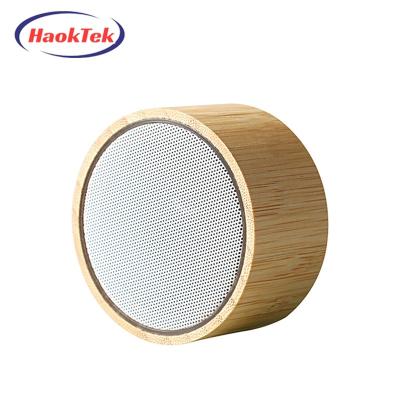 China New Promotional Wireless Round Competitive Price Gift Small Mini Portable Wooden Design Bamboo Wireless Speaker for sale