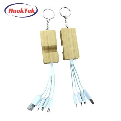 China MP3/MP4 Wooden Multi Cable Main Chain Charging New Wholesale Phone Holder HAOKTEK Usb Charge 3 In 1 Cable With Logo Print for sale