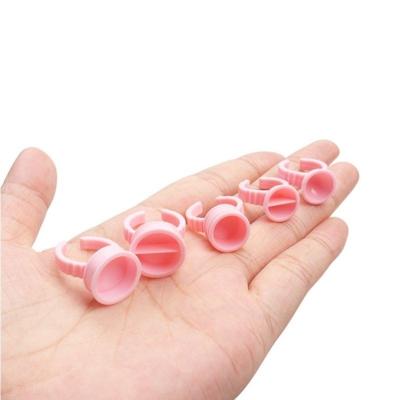 China Eyelash Extensions Glue Holder Professional Eyelash Extension Glue Plastic Pink Ring For Eyelash Extension for sale