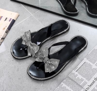 China Fashion Trend Black Pink Women Jelly Sandals Slides House Shoes Breathable Summer Flat Heeled Slippers for sale