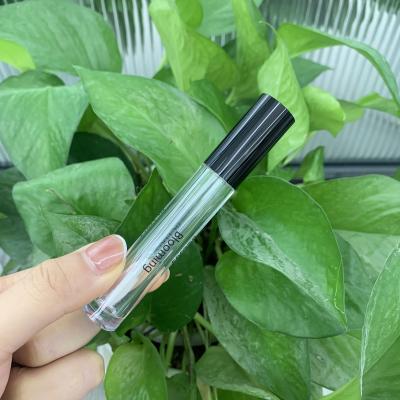 China Custom black top tubes logo lip gloss lip gloss lip gloss wand empty tubes wholesale gloss cosmetics for sale