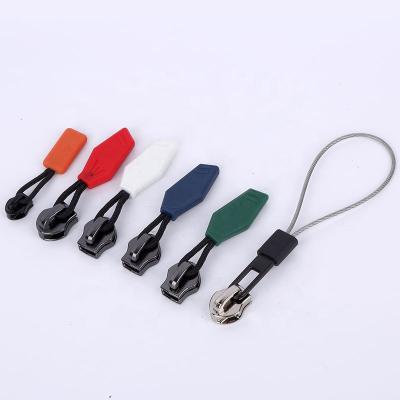 China Wholesale Fancy Puller Rubber Design Nickel Free Logo Plastic Mold Zipper Slider Custom Made For Bags Garment for sale