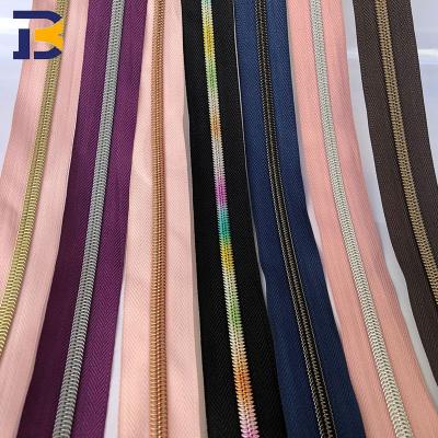 China Bulk Auto Lock Manufacturer Wholesale Rainbow Zipper Band #3 Gold Teeth Long Chain Nylon Zippers for sale