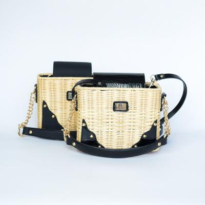 China Korean version of 2022 motion detection small square soft rattan woven bag handle black square soft rattan woven bag handle horizontal small inner bag for sale