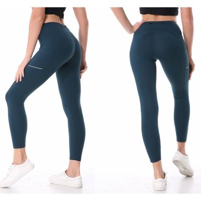 China Custom Nylon Spandex Antistatic Women High Waisted Yoga Pants With Pockets for sale