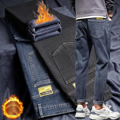 China 2021Stylish breathable jeans pants wholesale Autumn Winter men plus straight velvet jeans men's loose outer wear casual pants for sale