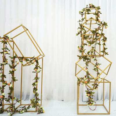 China Durable Wedding Decoration Pedestals Gold Supplies Events Lead Road Artificial Flowers Show Geometric Placed Iron Props for sale