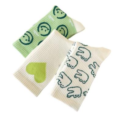 China Lightweight Sports Personality Smiley Face Socks Mid-Tube Socks for sale