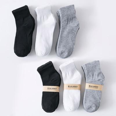 China Cheap Wholesale Breathable Cotton/Polyester Unisex Crew Socks For Men And Women Stocking Cheap Wholesale Sales for sale