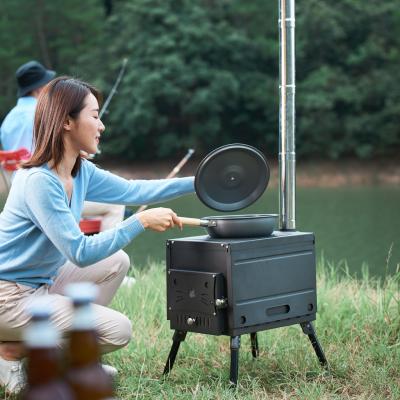 China Outdoor Camping Cooking Wood Stove Outdoor Camping Wood Camping Heating Grill Yard Road Trip Stove Tent Stove for sale