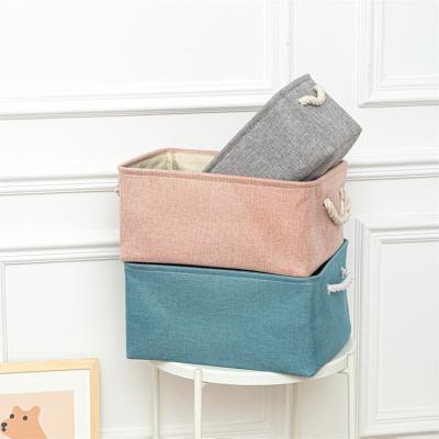 China Hot Selling Solid Color Cotton Rope Handle Classic Canvas Basket Folding Rectangular Daily Necessities Storage Basket for sale