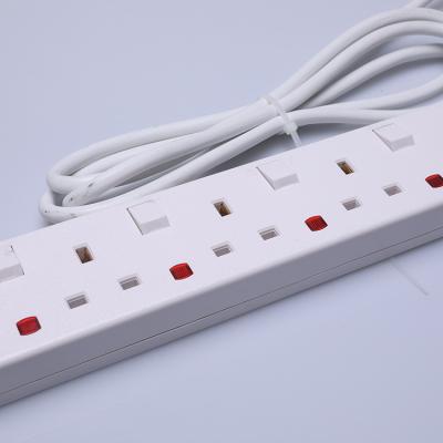 China Universal 4 Gang BS Outdoor Waterproof Switch Socket British Power Strip Surge Protector With Different Switches for sale