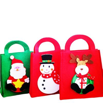 China 2021 fashion new arrival colorful reusable diy cotton storage packaging packaging Christmas felt candy gift bag for kids for sale