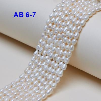 China DIY For Jewelry Making 6-7mm AB Rice Beads Strand White Freshwater Pearls Loose Chinese Beads Wholesale for sale