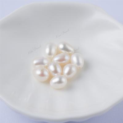 China Wholesale Bare Half Hole Pearl 6.5*8.0 Pearl Plant Rice Shaped Nucleated Particles Natural Freshwater Pearl Drop Shaped Freshwater Pearl for sale