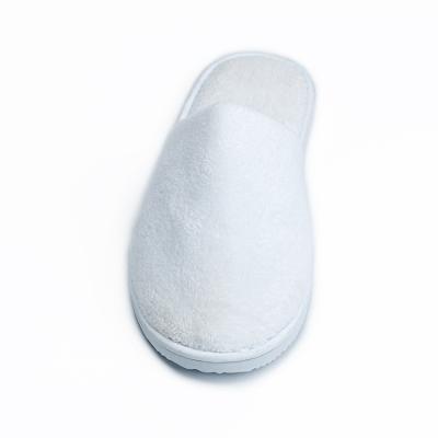 China Sale Guest Slippers Durable Anti-skid/Soft/Disposable Warm White Four Seasons Eco-Friendly Bulk Custom Hotel Luxury Disposable Slippers With Logo for sale