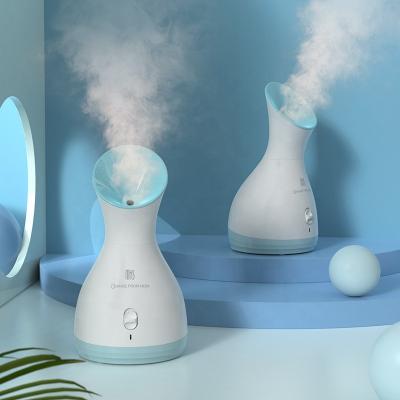 China New Arrival Warm Mist Humidifier Support Sample DEEP CLEANSING Skin Tightening With 180ml Water Tank Facial Steamer for sale