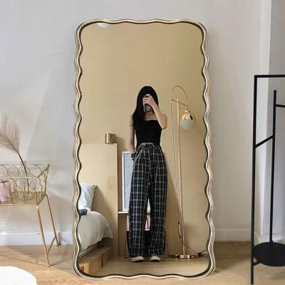 China Full-length Nordic style wave design household special-shaped wall landing Nordic style mirror wall decor luxury for sale