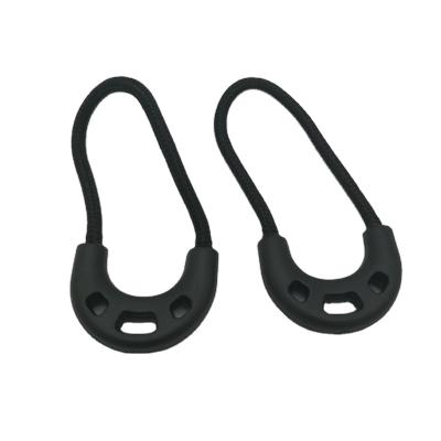 China Chinese custom private label head logo black rope puller nickel free soft plastic zipper pullers for sale