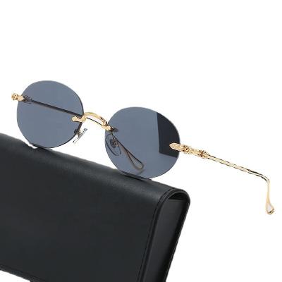 China Fashion Sunglasses Shape Retro Sunglasses Metal Oval Frameless Sunglasses For Women Men Unisex Sunglasses for sale