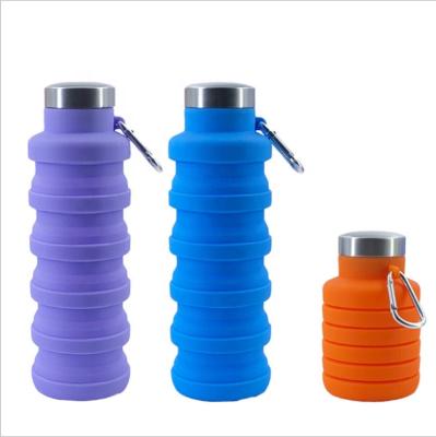 China Viable Custom Logo Portable Soft Silicon 550ML Collapsible Water Bottles With Metal Lid Leakproof Portable Outdoor Key Chain for sale