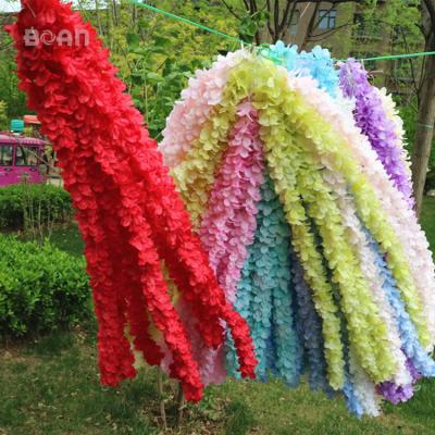 China Eco-friendly Simulated Wall Backdrop Decoration Artificial Silk Wisteria Hanging Flower for sale