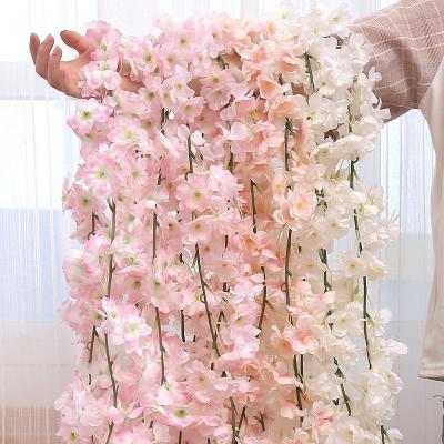 China Artificial Flower The Romantic Wedding Cherry Blossom Cane Wall Decoration Diy Hang for sale