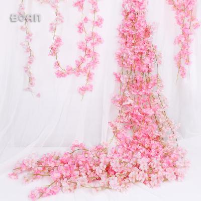 China Designs Wedding Wall Decoration Artificial Cherry Blossom Cane Diy Hang Flower for sale