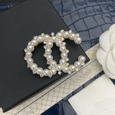 China Designer Pin Custom Fashion Rhinestone Pearl Brand Brooch Luxury Alphabet Bling Bling Channel Pins Brooch Jewelry for sale